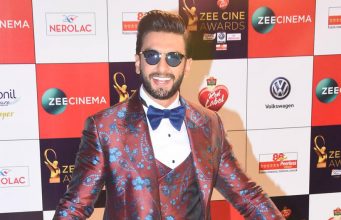 Ranveer Singh looked dapper in a rust red suit