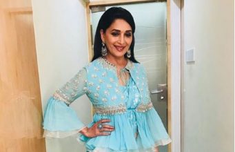 Madhuri Dixit in all blue satin sari from Ridhi Mehra’s latest collection