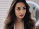 Malaika Arora sets the temperature high in this white pantsuit