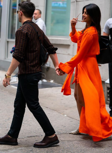 Priyanka Chopra looks hot in this tangerine coloured dress