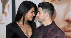 Priyanka Chopra Jonas in black gown at premiere of "Chasing Happiness"