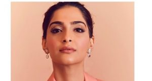Sonam Kapoor Ahuja looks glamorous in this Fenty coral pantsuit