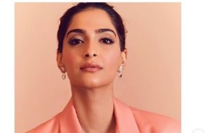 Sonam Kapoor Ahuja looks glamorous in this Fenty coral pantsuit