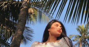 Athiya Shetty looks dazzling in this thigh-high slit slip dress