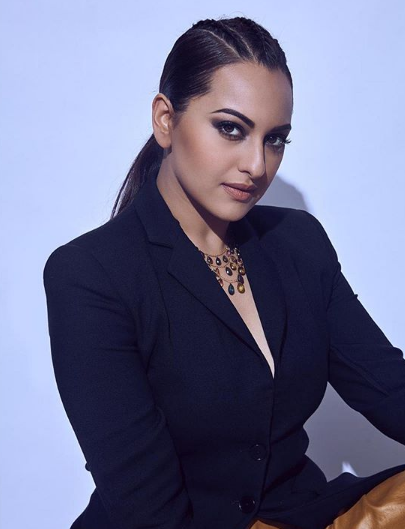 Sonakshi Sinha fails to impress in black blazer with a flowy golden skirt