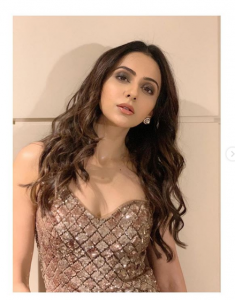 Rakul Preet looks raashing ingold thigh-slit embellished dress