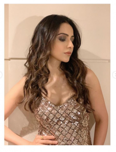 Rakul Preet looks raashing ingold thigh-slit embellished dress