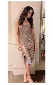 Rakul Preet looks raashing ingold thigh-slit embellished dress