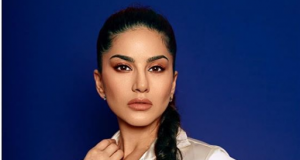 Sunny Leone stuns in thigh-slit satin sheer dress