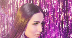 Malaika Arora looks hot in a purple powersuit