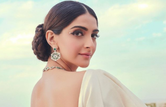 Sonam Kapoor looks glamorous in a white sari