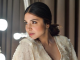 Anushka Sharma looks beautiful in white sequined figure-hugging dress