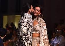 Ranveer Singh, Deepika Padukone kiss on the ramp as they walk at a fashion show,