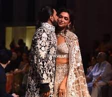 Ranveer Singh, Deepika Padukone kiss on the ramp as they walk at a fashion show,